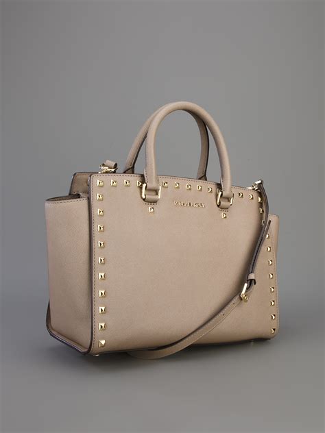 michael michael kors selma preforated satchel|Michael Kors selma bag.